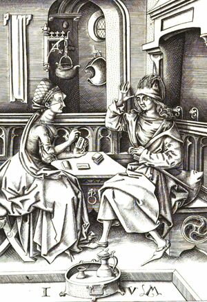 Two Women Playing Cards in the Kitchen. 